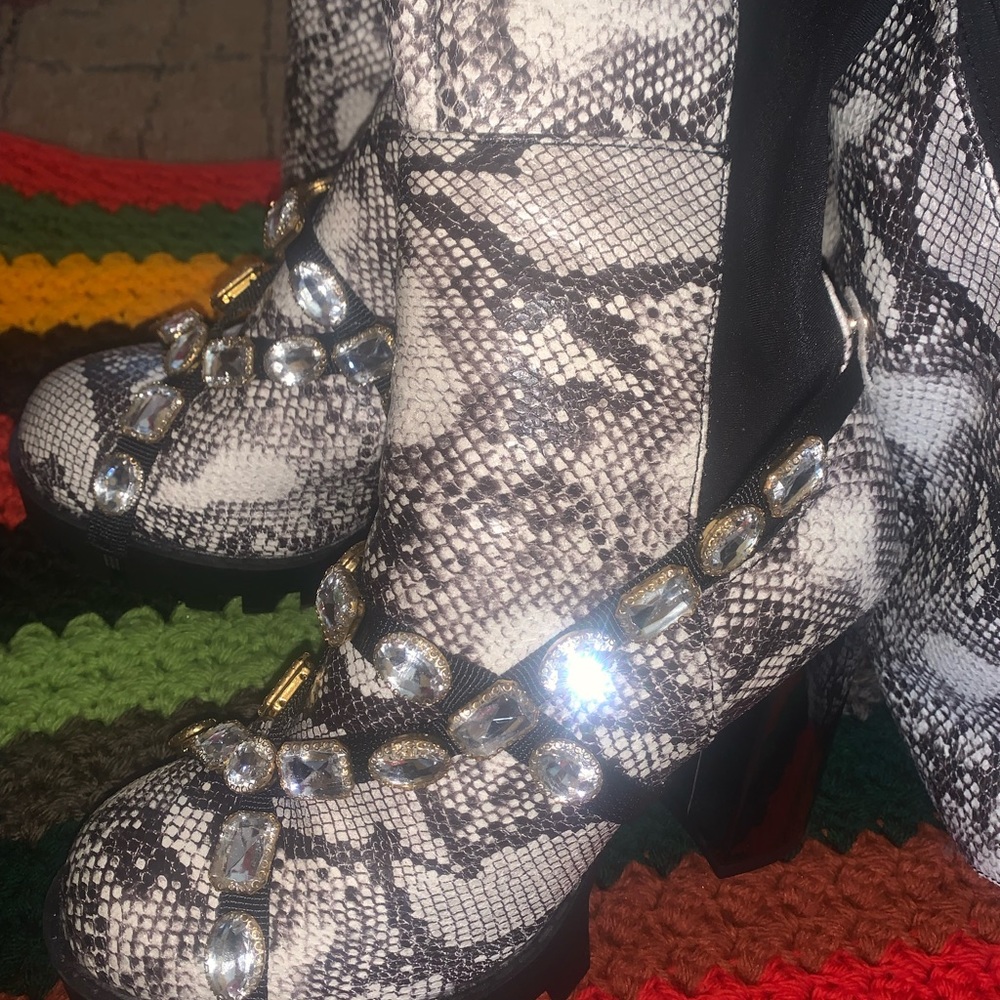 Thigh high animal print boots.worn once